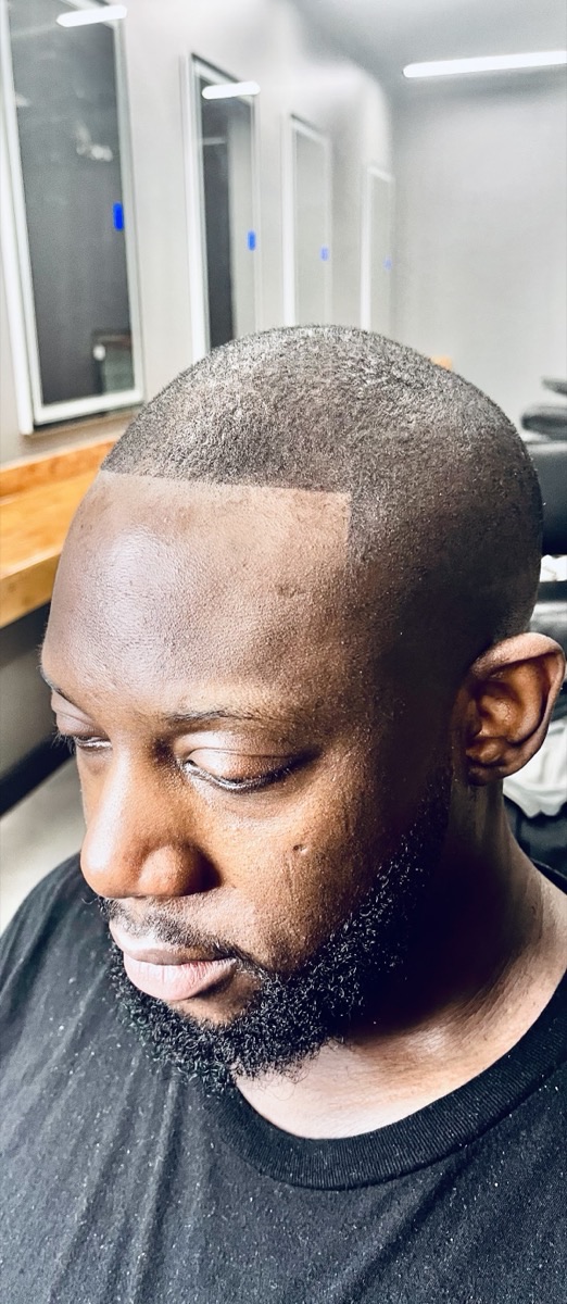 Clean modern fade and crisp line-up by Mark at Clipper Zone Men's Grooming Studio in Stockbridge, GA
